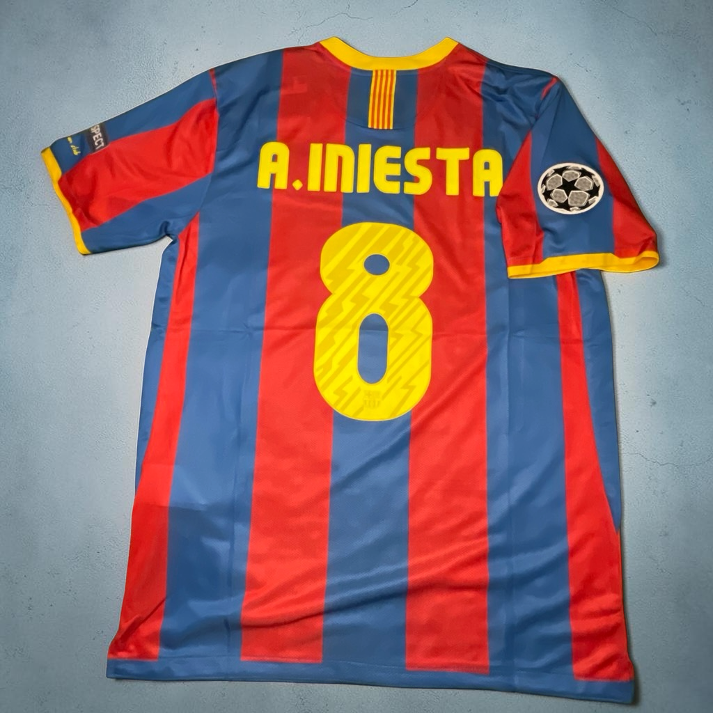 Blessed Jerseys FC Barcelona Iniesta soccer jersey with number 8 on the back, red and blue vertical stripes, yellow trim.