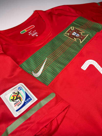 Blessed Jerseys Portugal National Team Soccer Jersey, red polyester Dri-FIT with green band, crest, and 2010 World Cup patch.